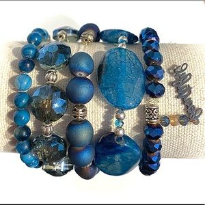 5 strand multilayered stretch bracelets in blue.